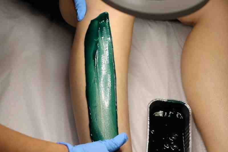 do you apply hard wax against hair growth